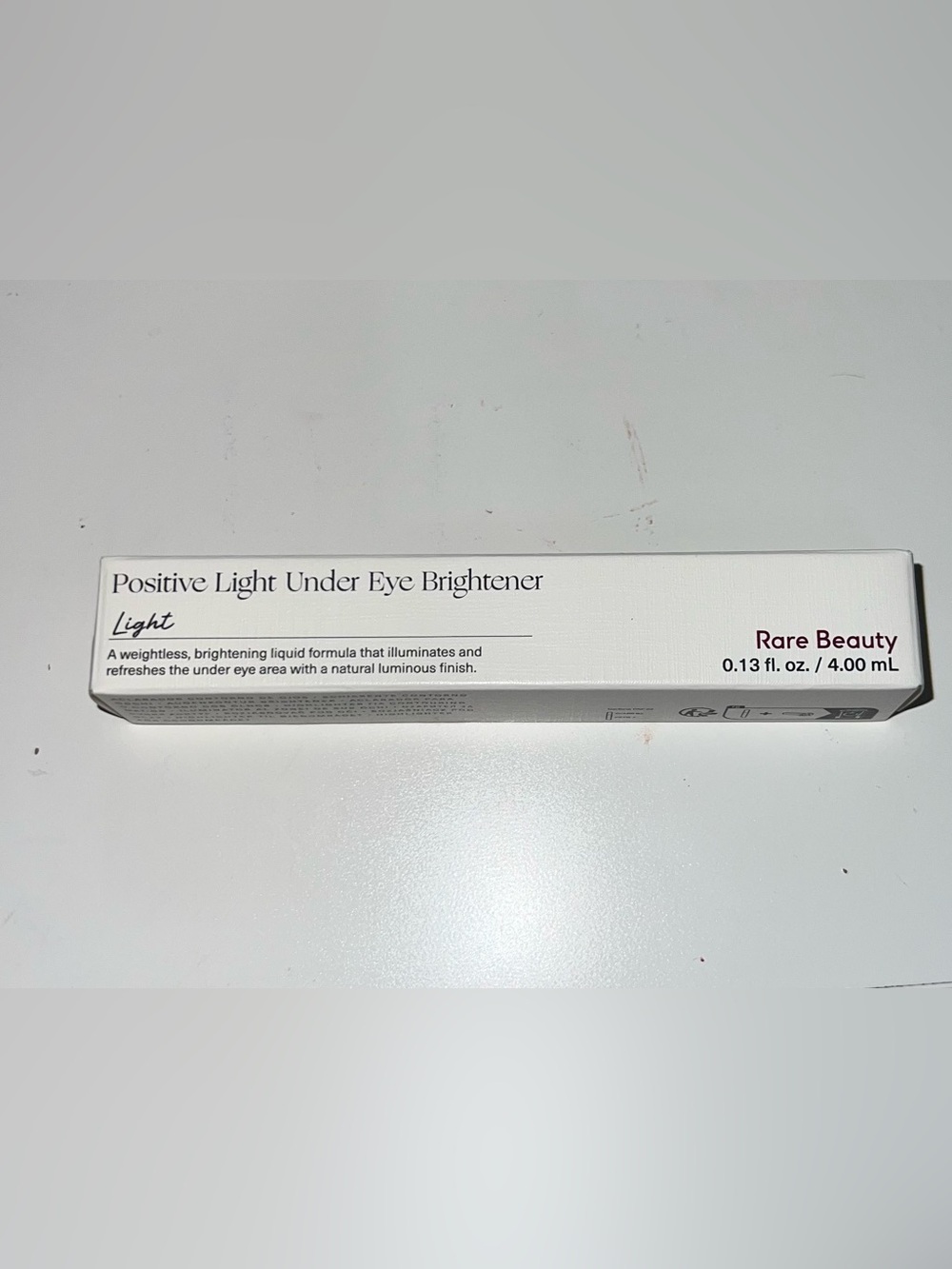 Rare Beauty Light Under Eye Brightener - White